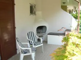 Holiday home with garden and shared pool