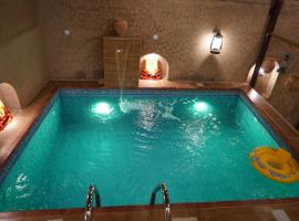 نزل مزارعة التراثية mazarah heritage inn, hytte i Nizwa