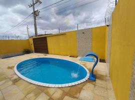 Casa mobiliada com piscina para aluguel por diárias em Martins-RN, מקום אירוח ביתי בMartins