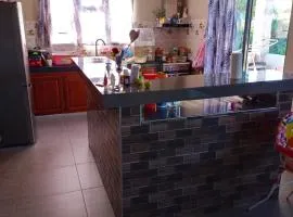 Enchanting Bungalow in Chemin Grenier with Jacuzzi and Garden