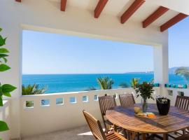 Amazing ocean view in beachfront condo Flamingos Beach Club, vacation home in Mezcales