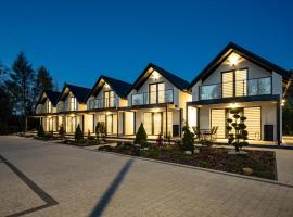 Urocze Ubocze Luksusowe Domki, casa de campo em Ustroń