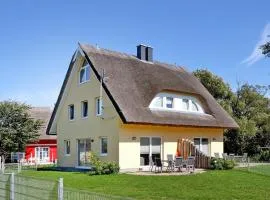 Thatched roof house Lotte with sauna and fireplace at the marina in Vieregge