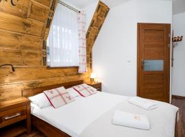 Willa Pod Reglami - Małe Ciche - Sauna & Jacuzzi - 400m od Stacji Narciarskiej, hotel in Male Ciche