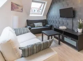Apartment Vosseslag II duplex sunny appartment by Interhome