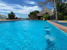 Menai Bay Beach Bungalows, hotel perto de Zanzibar Butterfly Centre, Unguja Ukuu