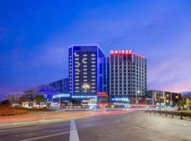 Huzhou Wealth Hotel, hotel en Huzhou