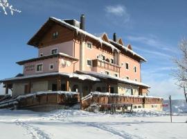 Principessa Giovanna Boutique Chalet, отель в городе Роккаразо