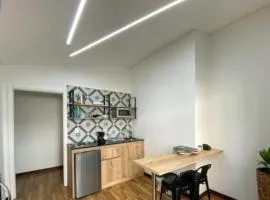 Apartamento cerca al centro comercial Santafé A105 By Roots Rentals