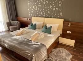 Velence Sunset Wellness Apartman, hotel com spa em Velence