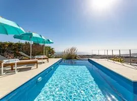 "NEW" Deluxe designer Villa Infinity, with Panoramic sea views,own exclusive heated private pool, subtropical gardens