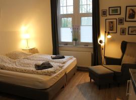 Apartment am Wall, aparthotel in Emden