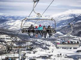 Modern lakehouse with jacuzzi & sauna, near golf and alpine