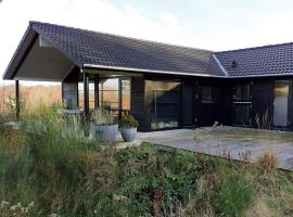 7 person holiday home in Vejby，瓦伊比的飯店