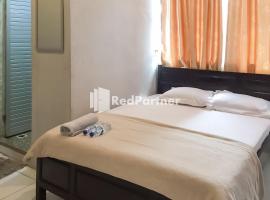 Aquino Marito Homestay Mitra RedDoorz, hotel di Balige