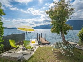 Il Glicine appartamento con darsena privata a lago – apartament w mieście Pettenasco