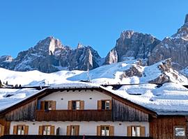 LA PULCE INNEVATA - mansarda sulle piste, Dolomiti Affitti, hotel a Passo Rolle