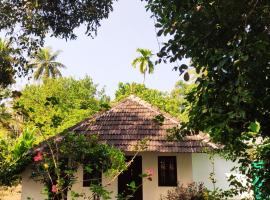 Munroe Inn Homestay, hotell i Kollam