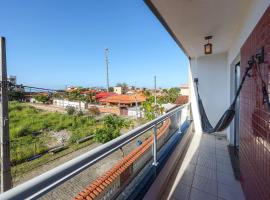 Apart a 450 metros da Praia de Ponta Negra RJ، فندق مع موقف سيارات في جاكوني