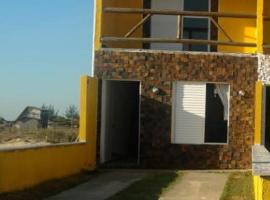 Recanto das Pedras - Casa Pedra Ferrugem Com vista para o mar, hotel a Jaguaruna