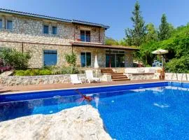 Stone clad Villa La Maison P