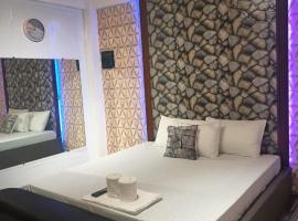 DJCI Apartelle Walk to Robinson & NE Pacific Mall 3 Min to SM Cabanatuan, hotel v destinaci Cabanatuan