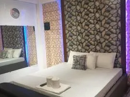 DJCI Apartelle Walk to Robinson & NE Pacific Mall 3 Min to SM Cabanatuan