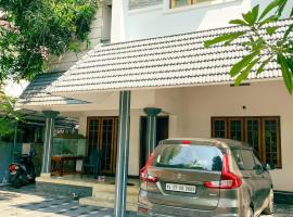 Budget Home, hotel en Kochi