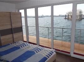 Schwimmendes Ferienhaus Swimming Lounge, hotel en Kappeln