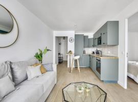 Superbe appartement avec balcon et parking proche Paris, hotel in Saint-Denis