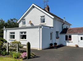 Milltown Cottage，Aghanloo比內韋納山（Binevenagh Mountain）附近的飯店