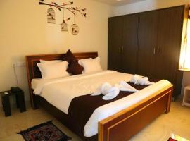 Homey Suites - Vizag Beach，維沙卡帕特南的三星級飯店