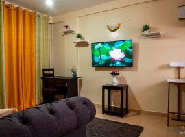 STYLISH 1BR APARTMENT IN KISUMU: FAST WI-FI, NETFLIX, SECURE PARKING, hotel cerca de Aga Khan Hospital Kisimu, Kisumu