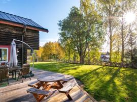 Luxurious Log House - Gränsfors 354, hotel pet friendly a Bergsjö