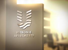 Ustronie Apartments z widokiem na morze 20 m do plaży, икономичен хотел в Устроне Морске