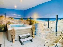 Gîte "Aux portes de la baie" avec jacuzzi 6 pers โรงแรมที่มีที่จอดรถในAigneville