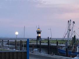 Wohnung "Strandturm" in Wremen am Deich, hotel v destinaci Wremen