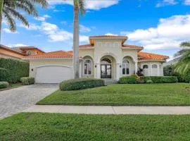 SW exposure home on wide canal with pool and spa