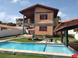 linda casa beack park porto das dunas, hotel in Mangabeira