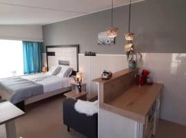 Appartement Duinzee Texel、デ・コーフのアパートメント