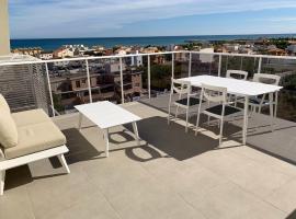 Ático con terraza y vistas al mar - Playa tranquila - Oliva, Hotel in Oliva