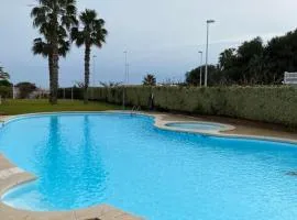 Apartamento con piscina en una preciosa playa