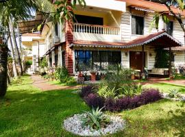 SHANU'S SEASIDE INN - A Guesthouse, 100 metres to Candolim Beach, casa de hóspedes em Candolim