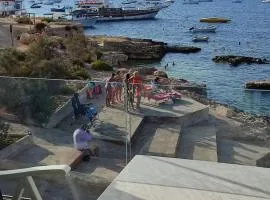 BEACHFRONT with Seaviews Apartment No56 Award Winner Unbeatable Location for Closeness to the Sea Ideal for Guests looking for Winter Spring and Autumn Breaks in Sunny Malta Also Ideal for Coastal Hikers