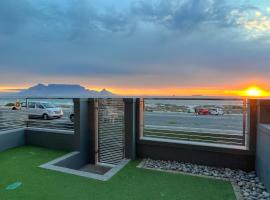 Seacrest Luxury Beachfront Apartment - Blouberg Beach, hôtel à Bloubergstrand