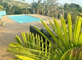La Kaz Surprise Rez de villa piscine et vue océan