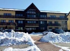 Mezonetov&yacute; apartm&aacute;n v Osčadnici, acomoda&ccedil;&atilde;o com cozinha em O&scaron;čadnica