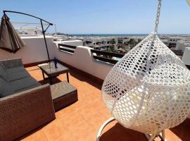 Casa Roja apartamento con balcón azotea y piscina comunitaria