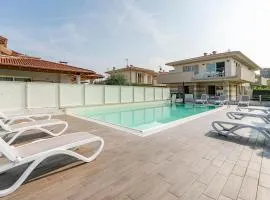 Cozy Apartment In Puegnago Sul Garda With Outdoor Swimming Pool