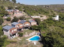 Cabañas Doña Itati, hótel í Villa Carlos Paz